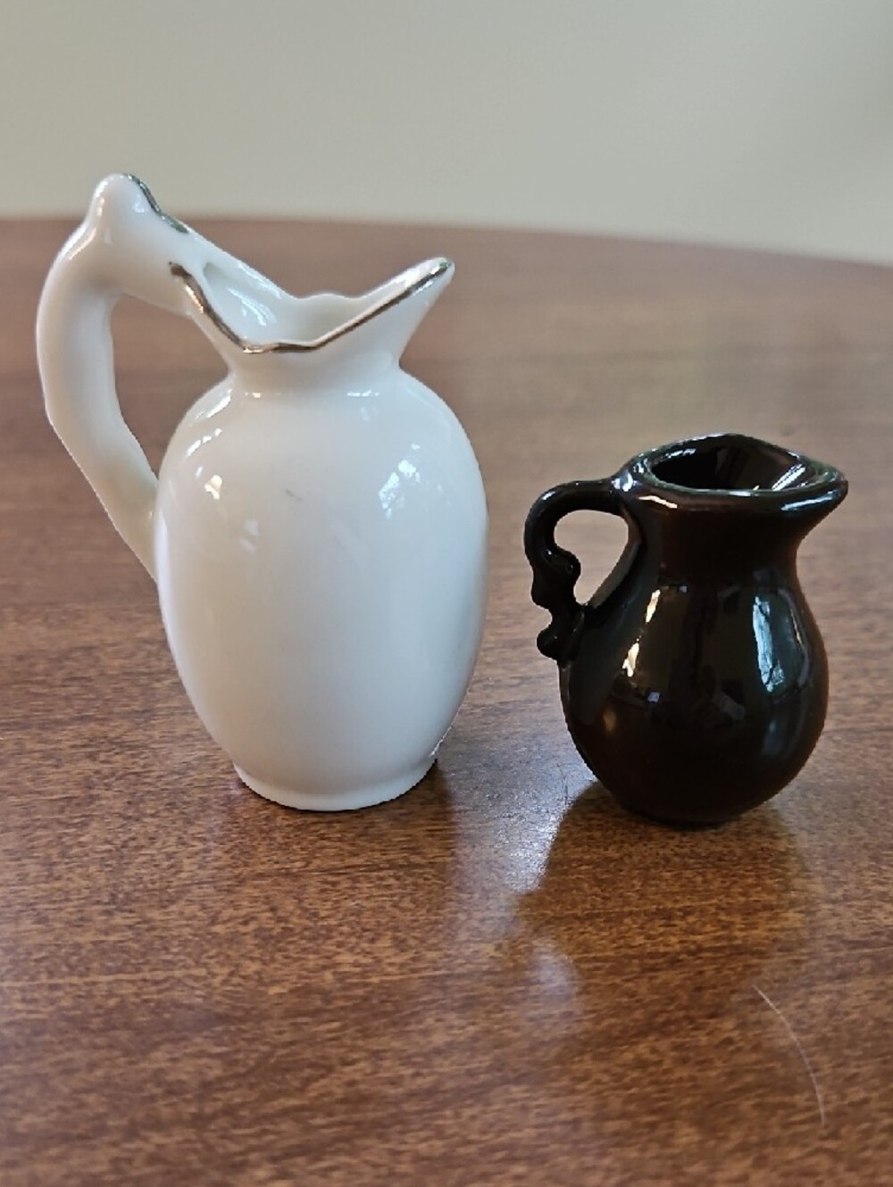 Two Miniature Native American Motif Pitchers - Picture 3 of 5